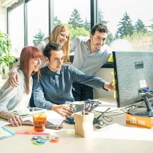 Group of students using computer