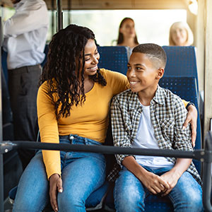 Mother with son on bus